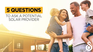 5 questions to ask a potential solar power provider blog post image. With a happy family smiling in the sun. 
